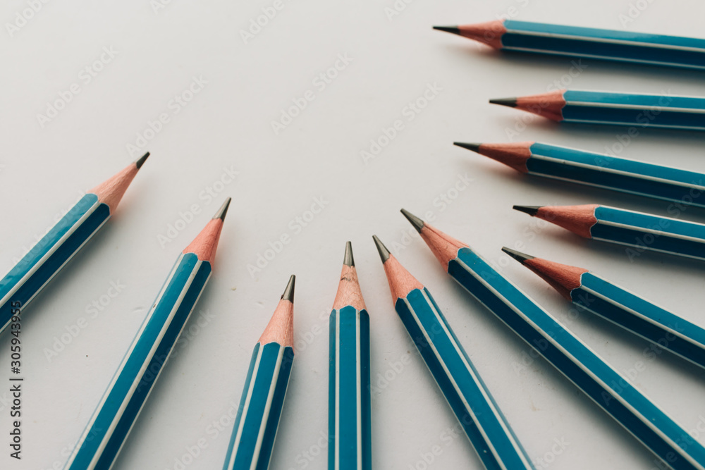 Composition of pencils on white background