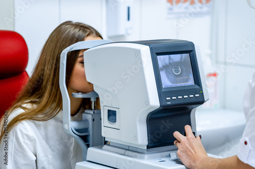 patient in ophthalmology clinic during the study of computer vision defects. Ophthalmologist. medical, health, ophthalmology concept