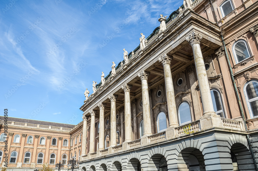 Buildings in the complex of Buda Castle, Budapest, Hungary. The historical palace building, facade with pillars and arch windows. Tourist attraction and national heritage