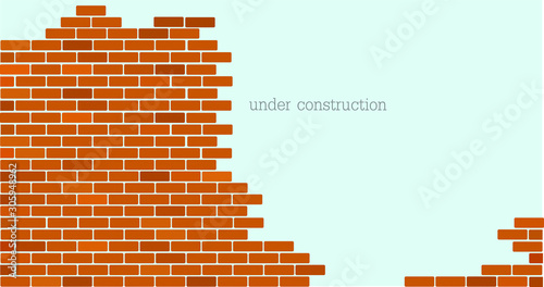 Website is under construction text and brick background.