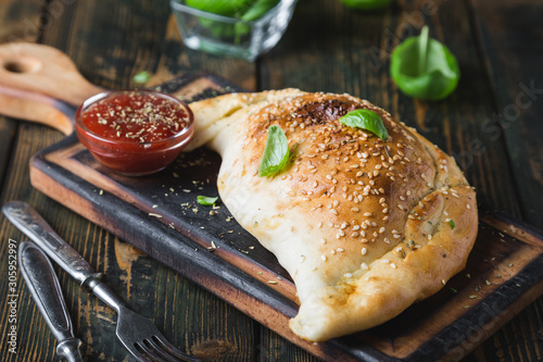 Tableau sur toile Calzone pizza with chicken and cheese