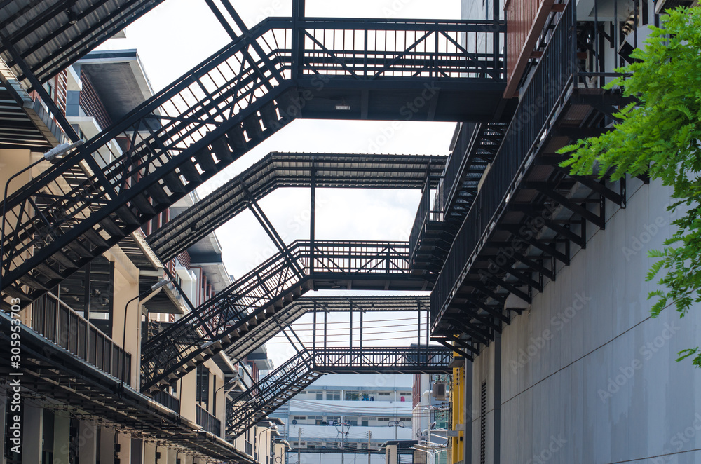 Bridge between buildings with roofs Bridge between buildings with roofs