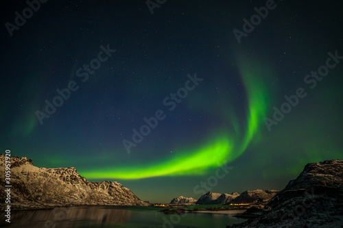 beautiful aurora borealis  polar lights  over mountains in the North of Europe - Lofoten islands  Norway