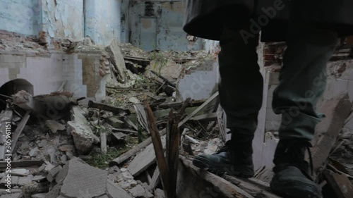 Wallpaper Mural Researcher examines the ruins of an old abandoned house in search of something unusual Torontodigital.ca