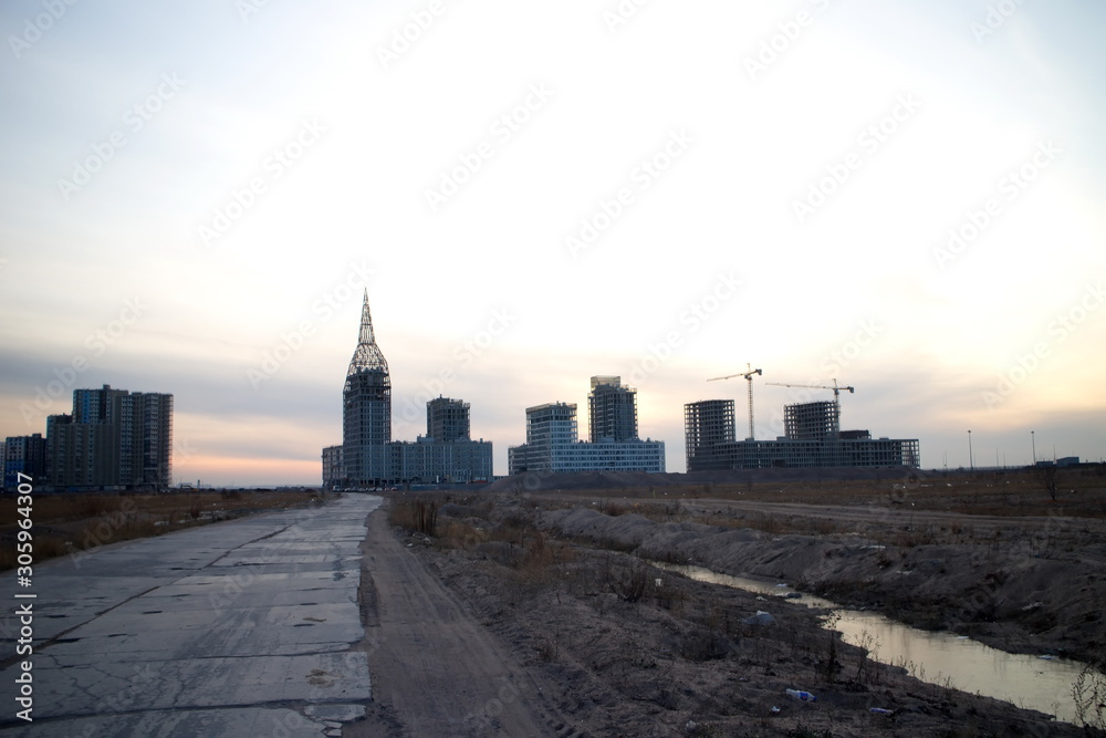 Fototapeta premium Urban construction on the outskirts of the city