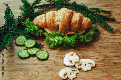 croissant with tomato cheese and mushrooms