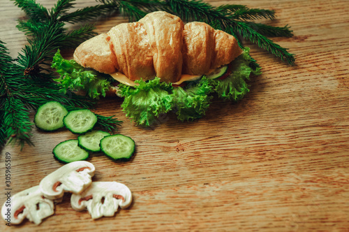 croissant with tomato cheese and mushrooms