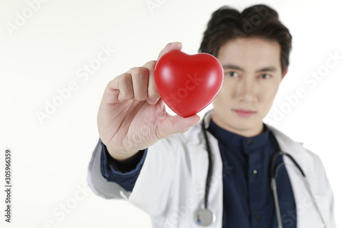 Medical​ doctor​ man with heart © ake