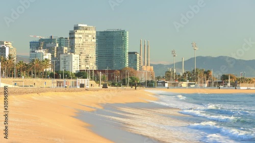 Morning on the beach of Poblenou in Barcelona, Spain photo