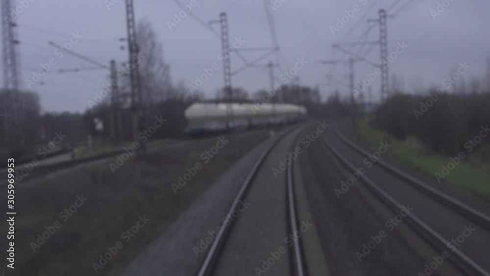 View from the last wagon of the train on rails while driving View from the last wagon of the train on rails while driving