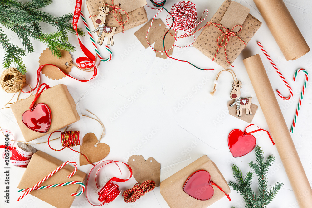 Fototapeta premium Christmas giftbox and presents wrapping in craft paper and decor