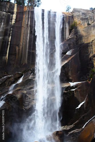 Close up of Vernal Falls in December with ice covered rocks  Yosemite National Park  California