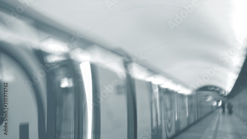 Abstract silhoettes of passengers in subway. Intentional motion blur. photo