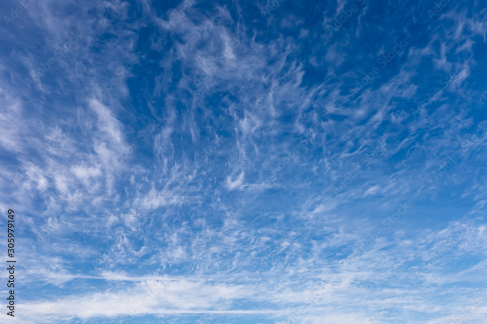 Beautiful spindrift clouds on a blue autumn sky in a frosty day. Beautiful spindrift clouds on a blue autumn sky in a frosty day.