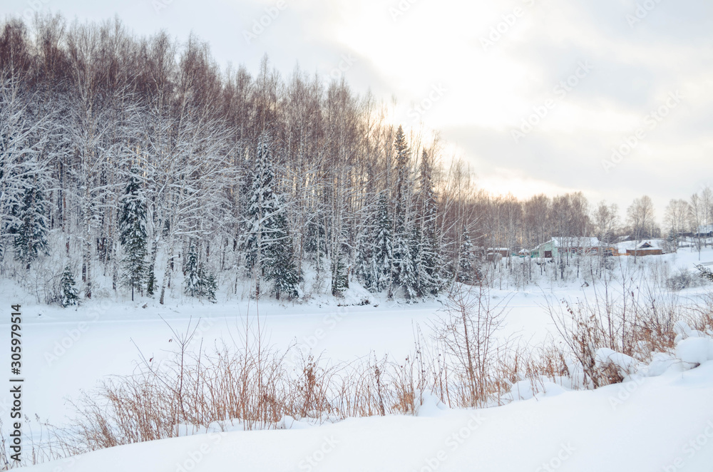 Snowy winter landscape with the forest and the sky, the sun. Winter forest trees in white snow. Frosty sunny day. New year Christmas in Siberia. Walk through the beautiful winter forest. Snowy winter landscape with the forest and the sky, the sun. Winter forest trees in white snow. Frosty sunny day. New year Christmas in Siberia. Walk through the beautiful winter forest.