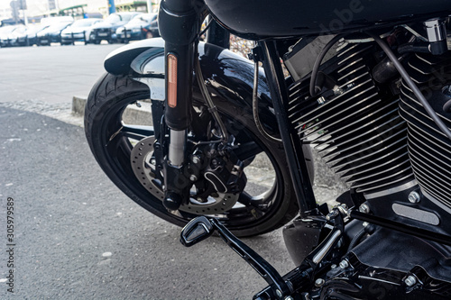 front of the motorcycle, wheel, disc brakes closeup