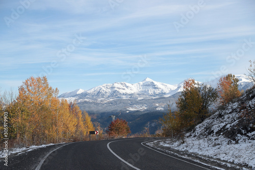 scenic view of empty road with snow covered landscape while snowing in winter season.turkey © murat