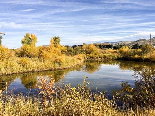 river in the rocky mountains with fall colors