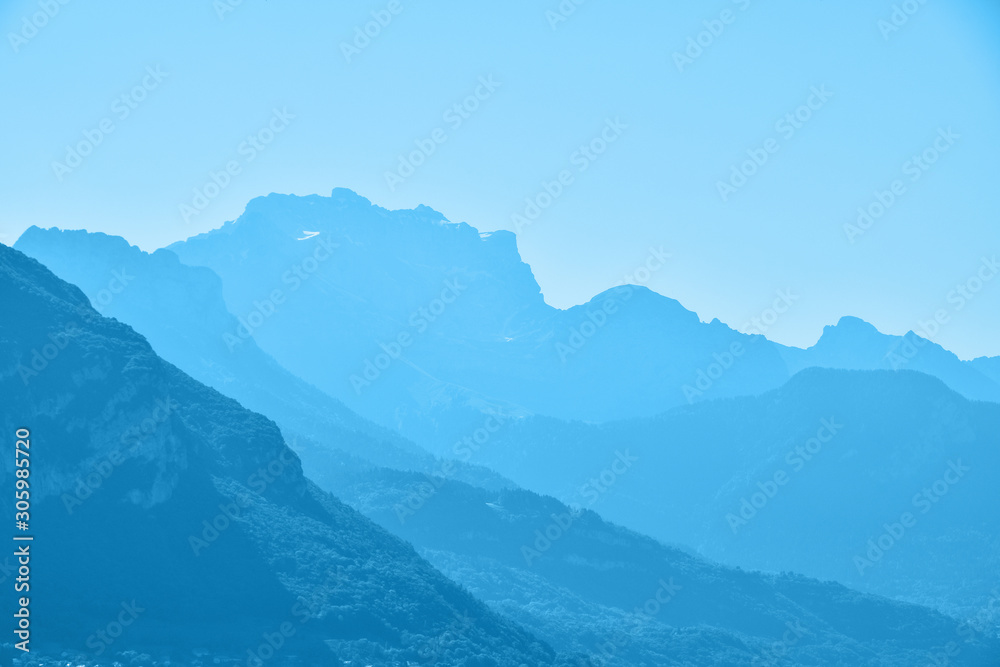 Blue toned aerial perspective mountain landscape