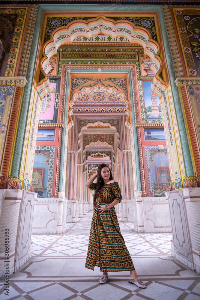 Young asian woman posing at Patrika gate, Jaipur, Rajasthan, India