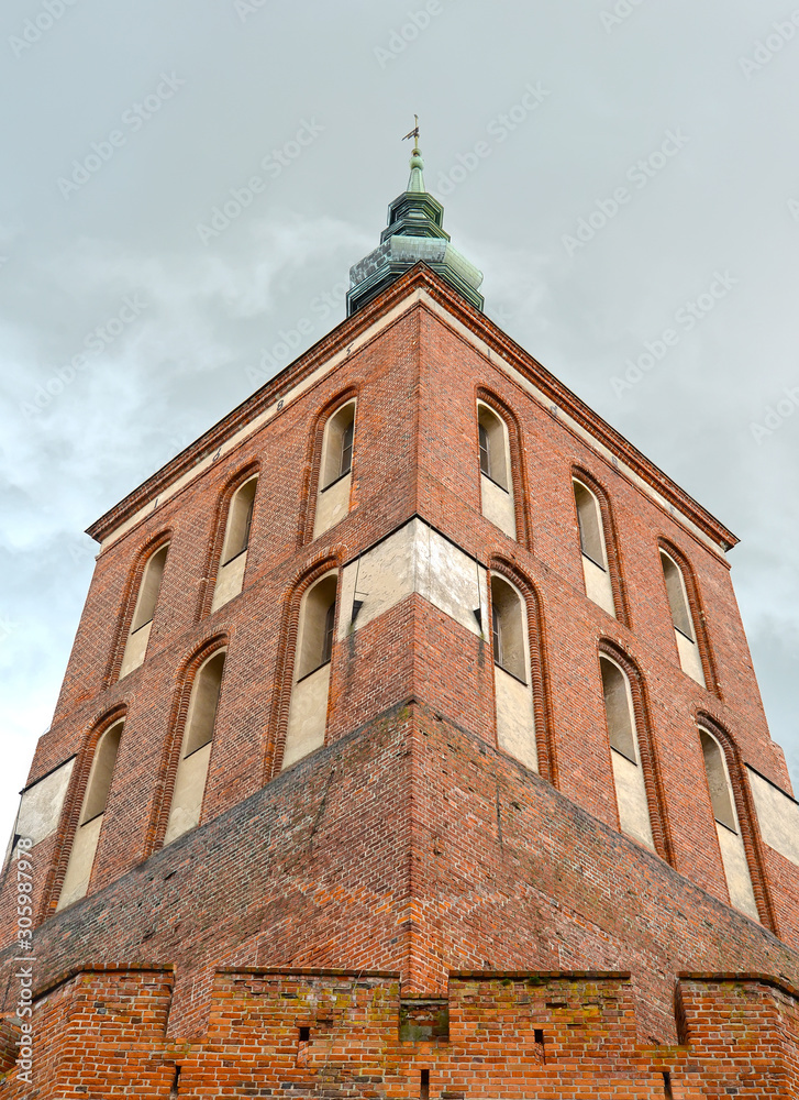 Fragment of brick cathedral bell tower (17th century). Frombork, Poland Fragment of brick cathedral bell tower (17th century). Frombork, Poland