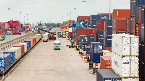 Logistics operation in railroad container yard with zoom out technique timelapse