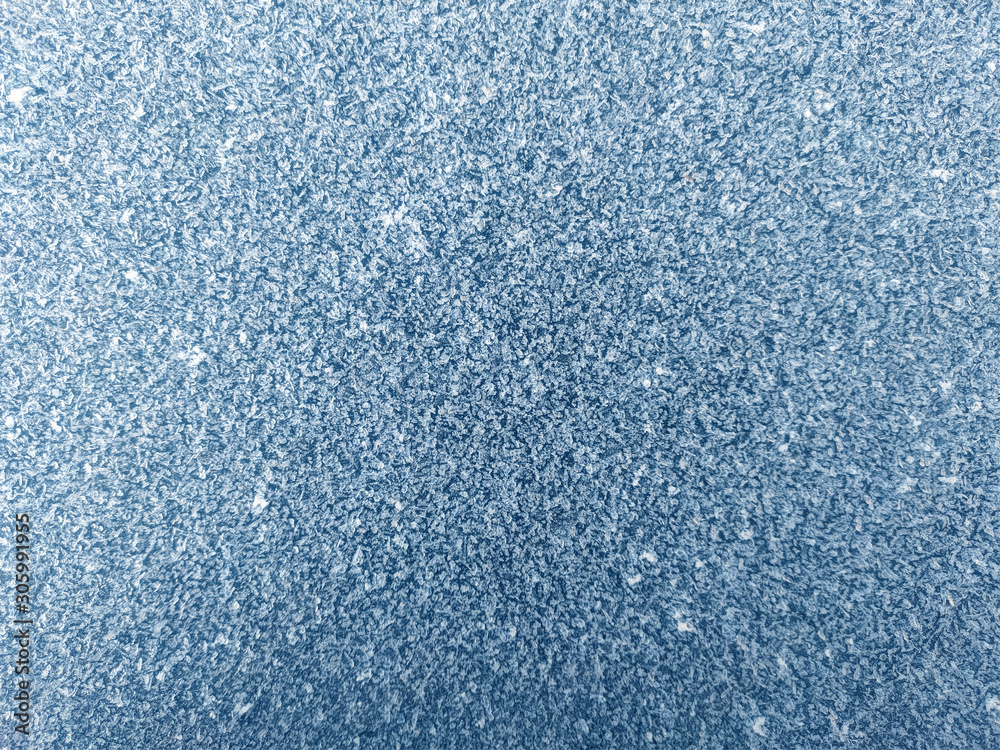 Ice crystals, close-up frost in the morning, frosty background, frost on the ground. Rime structure of snow. Focus in the center. Ice crystals, close-up frost in the morning, frosty background, frost on the ground. Rime structure of snow. Focus in the center.