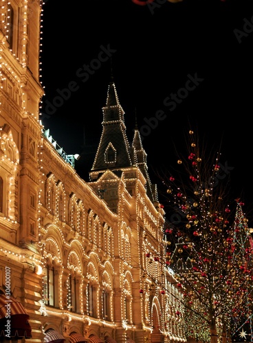 Christmas decorations on the street on the background of the Moscow Kremlin. Manezhnaya Square 
