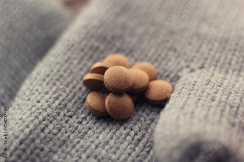 Closeup of ashwagandha pills. Supplement for winter.  photo