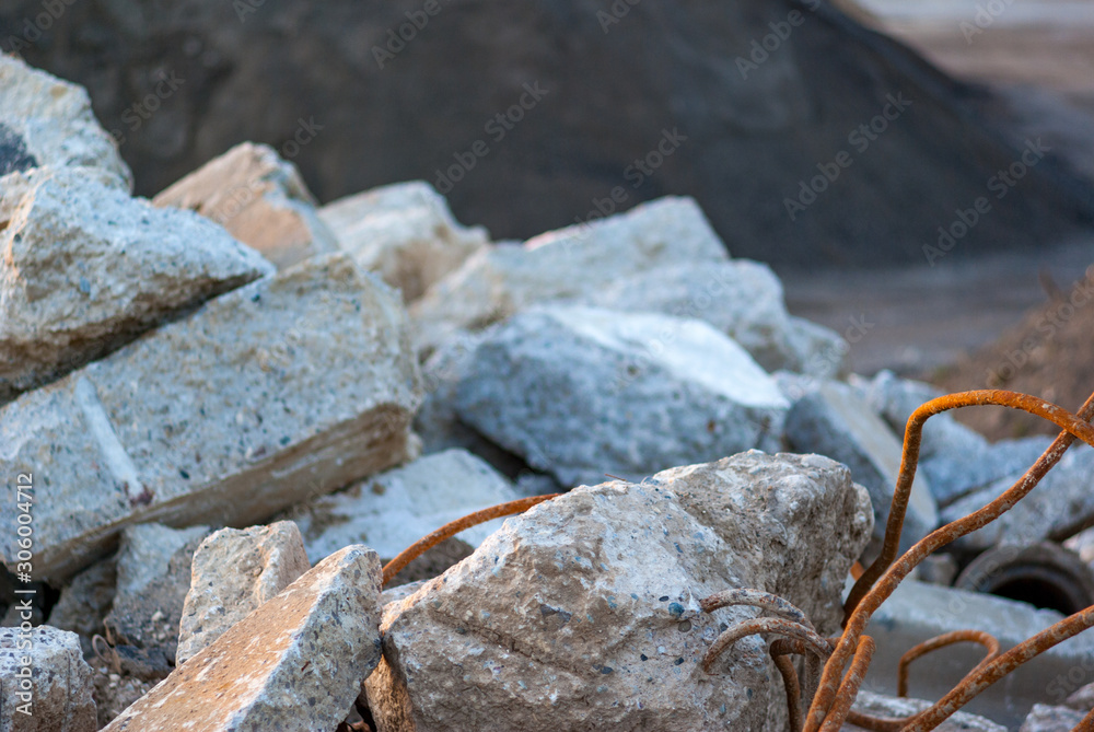Fototapeta premium Concrete slab with twisted and rusted rebar