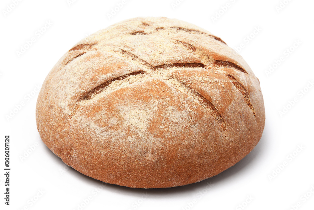 loaf of bread of round shape with a pattern on a white background