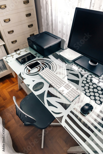 Tidy workstation with table, chair and technological devices