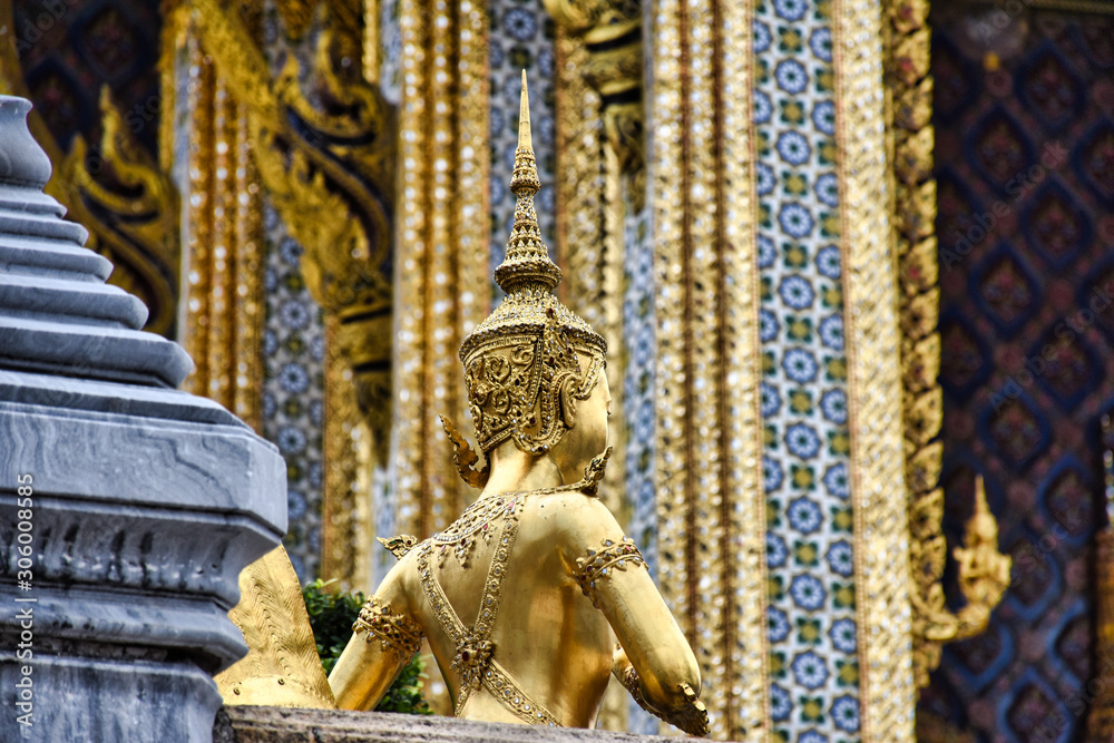 Beautifully stunning gold statue of a Kinnara, a beloved mythical half-human, half-bird creature on the Upper Terrace of Wat Phra Kaew or Temple of the Emerald Buddha in the Grand Palace in Bangkok Beautifully stunning gold statue of a Kinnara, a beloved mythical half-human, half-bird creature on the Upper Terrace of Wat Phra Kaew or Temple of the Emerald Buddha in the Grand Palace in Bangkok