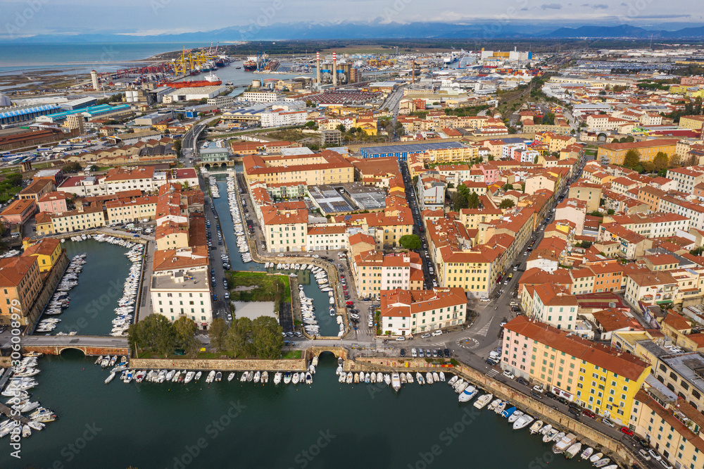 aerial view from drone to city streets with channels in Livorno in Tuscany in Italy