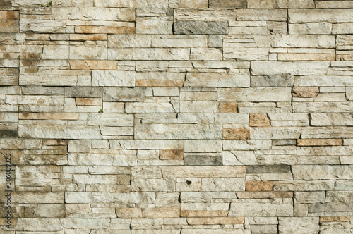 The wall surface is made of natural decorative stone.