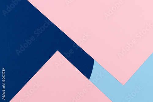 Abstract colored paper texture background. Minimal geometric shapes and lines in pastel blue, light pink and navy colours