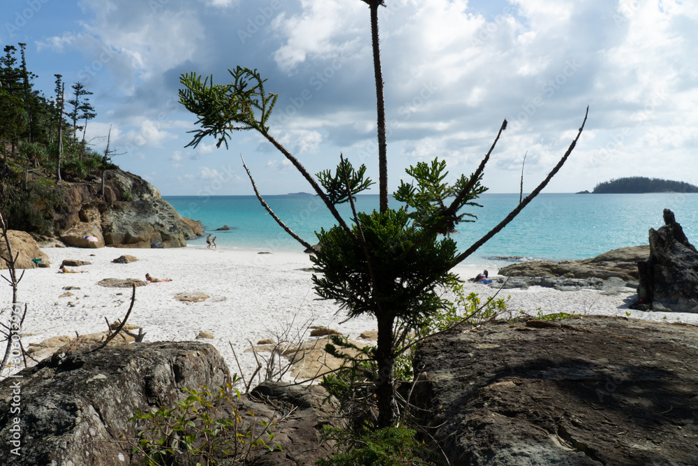 the white beach of the Whitsunday Islands in Australia, which consists of 99 percent quartz sand, and the azure blue sea