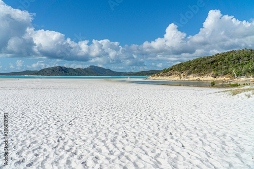 the white beach of the Whitsunday Islands in Australia, which consists of 99 percent quartz sand, and the azure blue sea