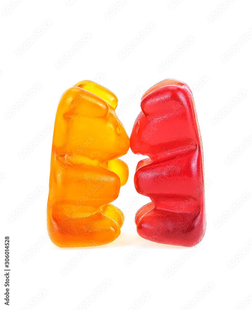 Kissing jelly bears isolated on a white background. Dancing gummy bears. Kissing jelly bears isolated on a white background. Dancing gummy bears.