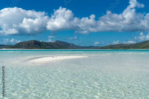 the white beach of the Whitsunday Islands in Australia, which consists of 99 percent quartz sand, and the azure blue sea photo