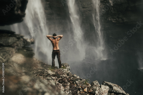 guy and waterfall cachoeira herculano