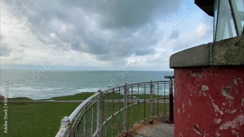 Walking on the platform of lighthouse Bovbjerg Fyr photo