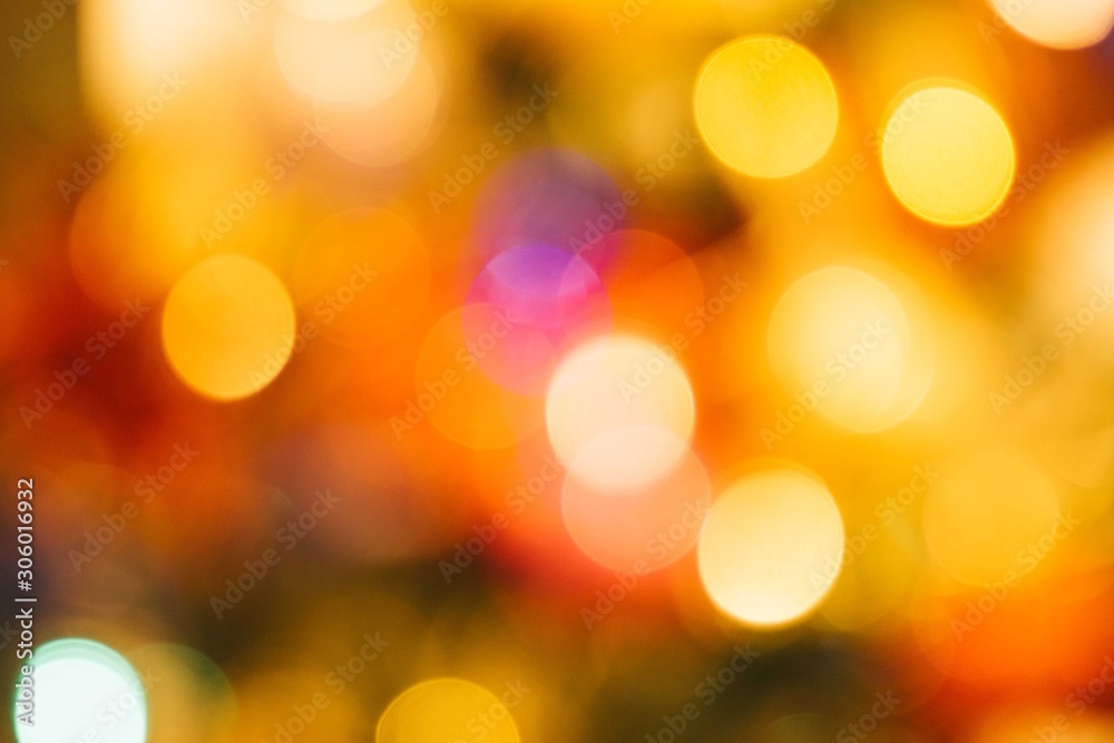 Warm christmas colors blurred background bokeh concept