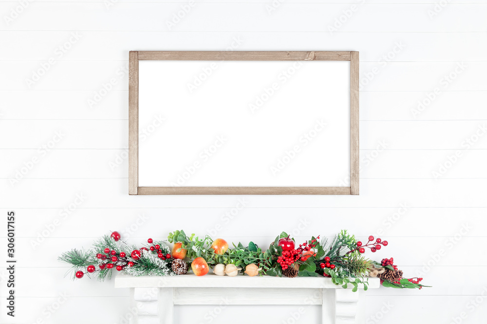 Horizontal wooden frame on a white wall Horizontal wooden frame on a white wall