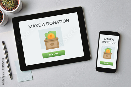 Donate concept on tablet and smartphone screen