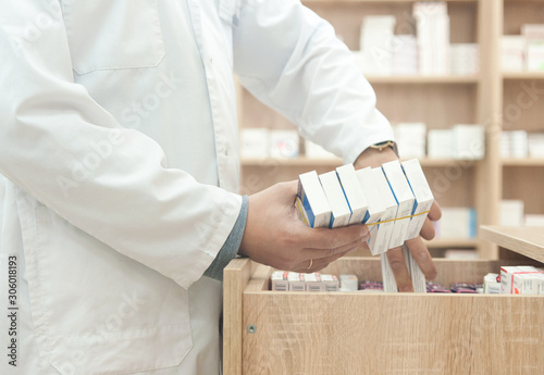 pharmacist in drug store photo