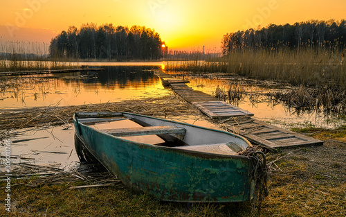 old fishing boat on the lake