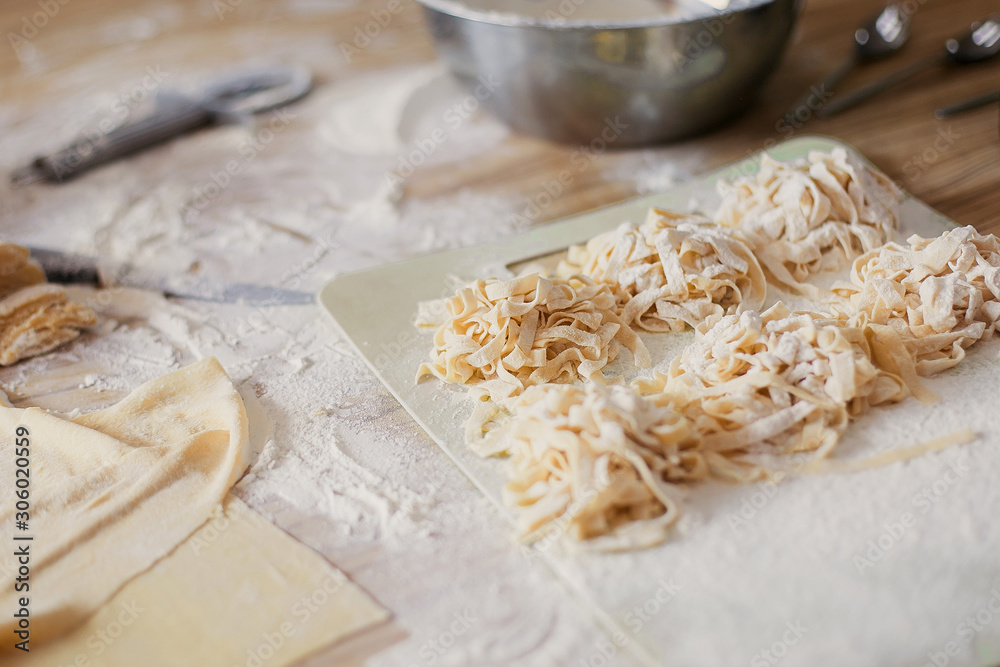 cooking with a noodle slicer dough for pasta uncooked noodles cooking with a noodle slicer dough for pasta uncooked noodles