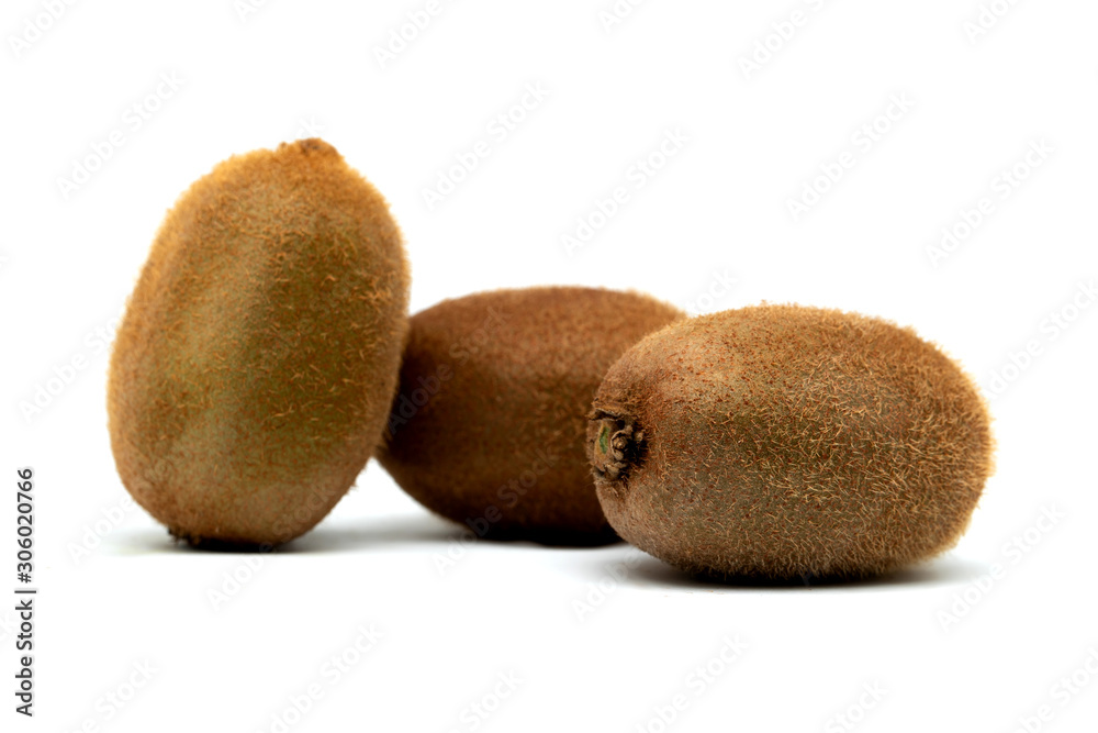 three fresh kiwis on the table three fresh kiwis on the table