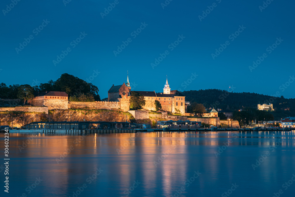 Oslo, Norway. Akershus Fortress In Summer Evening. Night View Of Famous And Popular Place